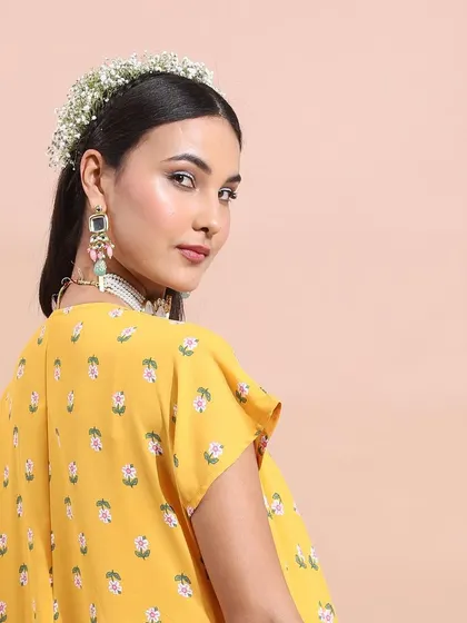 Another beautiful angle of the yellow ethnic wear, showing how the styling works from every side.