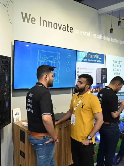We believe in collaboration. Our team is seen here at our expo booth, discussing our in-house developed drivers for Control4 and innovative cabinet cooling systems from AC Infinity with industry peers and clients.