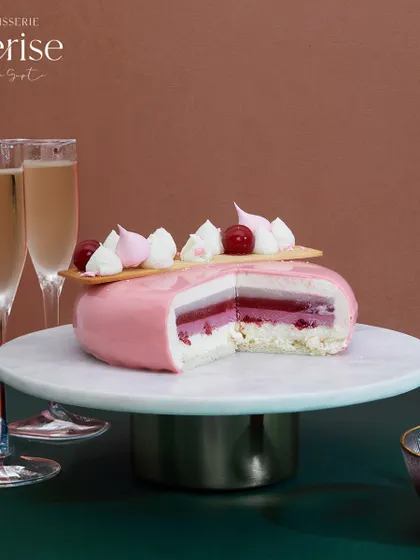 The "Explosion of Berries" pairs wonderfully with a glass of Prosecco. The wine's crispness balances the dessert's sweetness, making it perfect for a celebration.