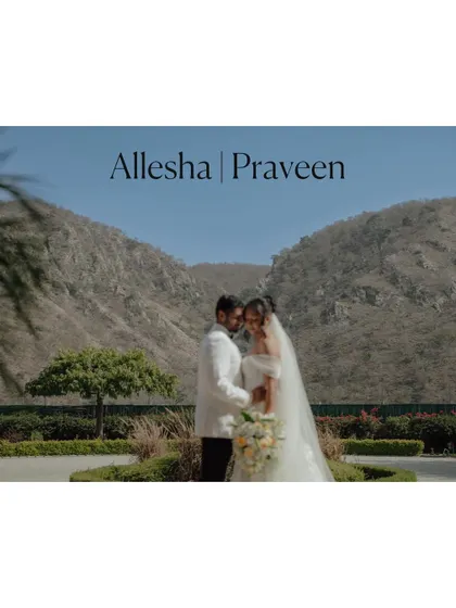 A beautiful title card for Allesha and Praveen's wedding, featuring their portrait against a stunning mountain backdrop.