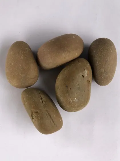 Smooth, rounded river pebbles with a brownish tint.