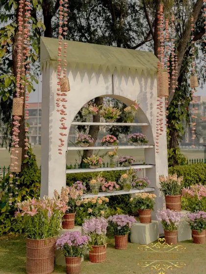 Another angle of the charming bouquet shop photo booth, a perfect spot for guests to take pictures.