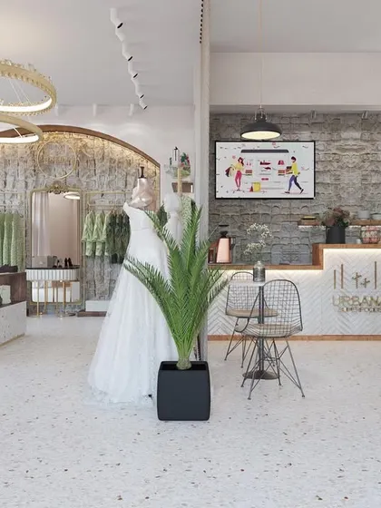 A complete view of a two-in-one concept store. On the left is the 'Beige Bag' boutique, and on the right is the 'Urbana Superfoods' cafe, designed to coexist harmoniously within a single retail footprint.