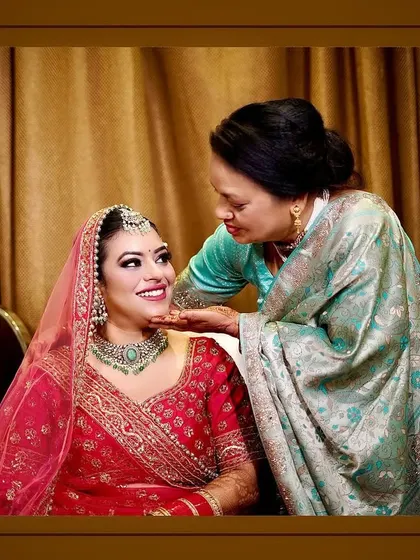 The bond between a mother and her daughter on a wedding day is truly special. We make sure to capture these quiet, emotional interactions amidst the day's celebrations, preserving the heartfelt connection in a timeless portrait.