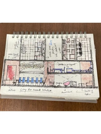A cross-section sketch from a designer's notebook. These drawings are crucial for working out interior layouts, spatial relationships, and the human scale of a project.