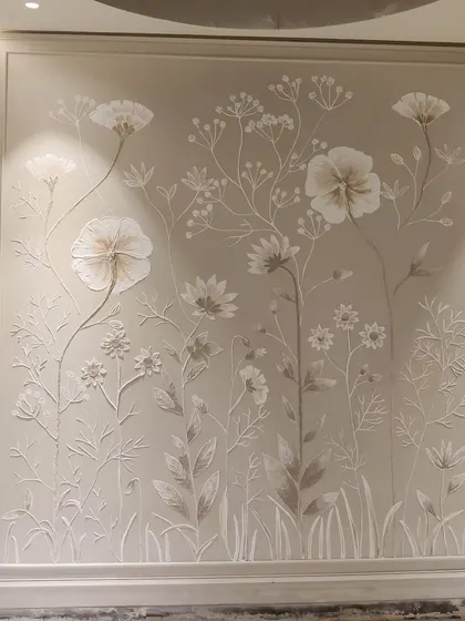 A closer look at the delicate, hand-sculpted flowers and leaves from a recent luxury home project in Delhi. Each element is crafted with precision to contribute to the overall serene and calming effect of the mural.