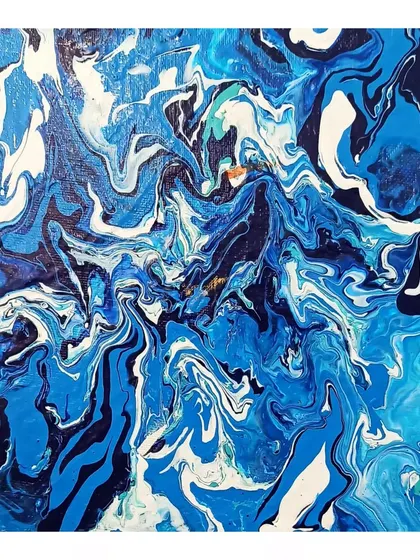 The completed fluid art canvas, showing the intricate patterns created by the flowing paint.