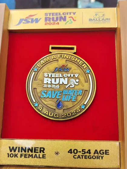 A close-up of the beautiful winner's medal from the JSW Steel City Run. A great memento from a successful race trip to Bellary.