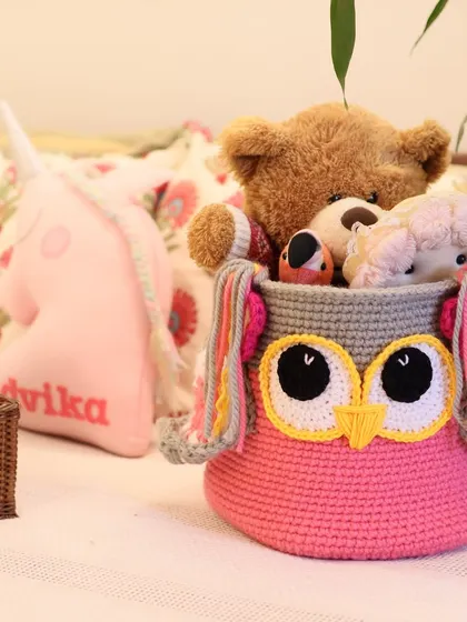 The Owlie Basket, a perfect and playful storage solution for a child's room. It’s great for keeping toys and books organized in a fun way.