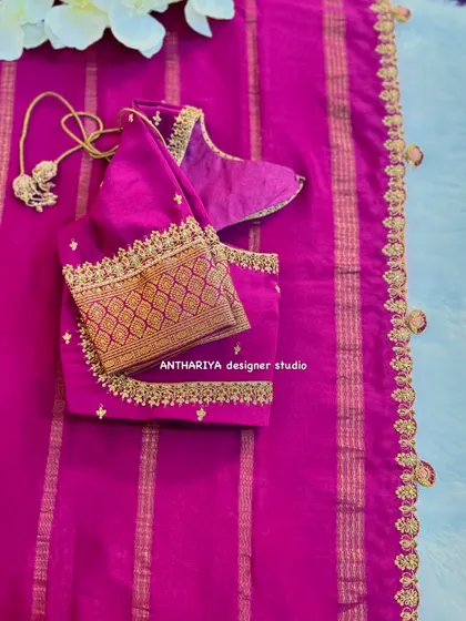 The front of the magenta blouse, showing the elegant brocade sleeves.