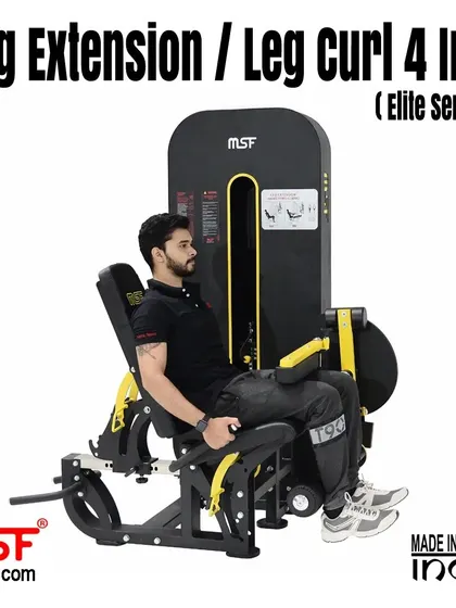 A user performing a seated leg extension on the 4-in-1 machine.