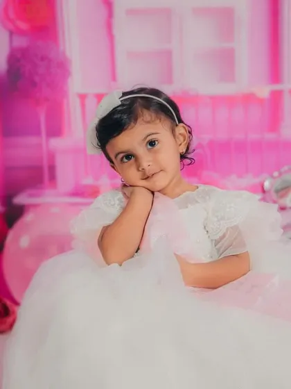 A pensive and adorable moment captured during the Barbie shoot. Even the quiet moments are beautiful.