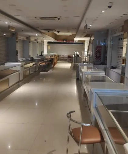 Before the renovation, the jewellery store was dated and cluttered. This image shows the old layout, which lacked a clear sense of luxury or flow.