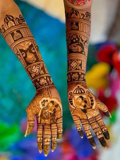 The complete view of this narrative bridal mehendi. The design includes portraits, auspicious symbols like the swastika, and traditional motifs, creating a rich tapestry of art.