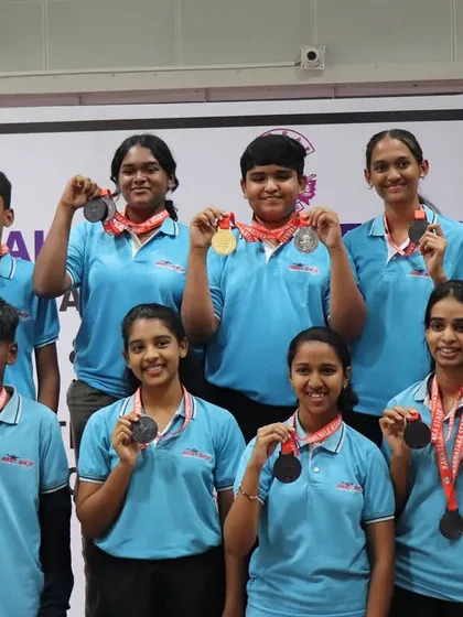 A proud group of our Air Rifle medalists from the sub-youth and junior women's teams, celebrating their ISSF medals at a state competition.