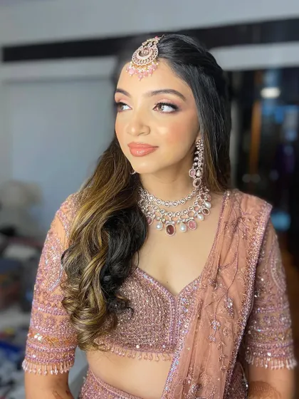 A beautiful dusty rose look for Hetal's engagement. I used monochromatic pink tones on her eyes, cheeks, and lips for a romantic and cohesive look.