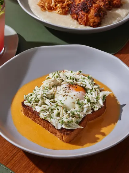 The Warm Crab Toast, a truly sublime dish that combines delicate seafood flavors with a comforting, creamy bisque.