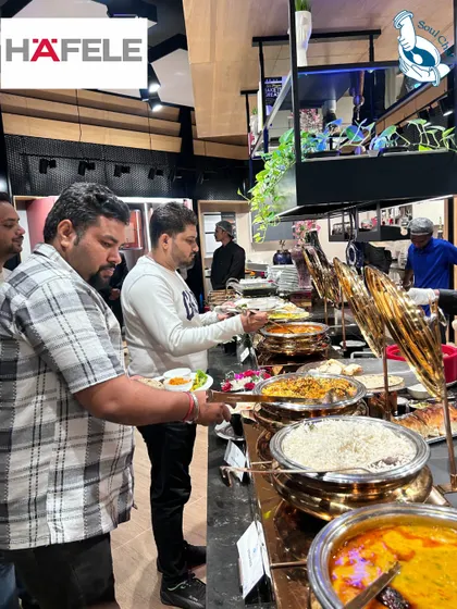 I believe in creating a grand impression. This extensive buffet setup for a corporate event at Häfele showcases our capability to handle large scale gatherings with elegance and an abundance of delicious options.