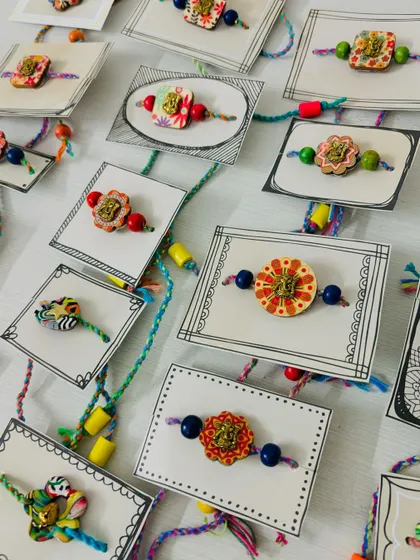 My whole collection of handmade Rakhis sold out so fast! I'm so grateful for all the love. Each one was packed on these hand-doodled cards.