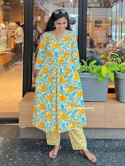 Starting Navratri with a splash of sunshine. This yellow floral set symbolizes joy and happiness, perfect for new beginnings.