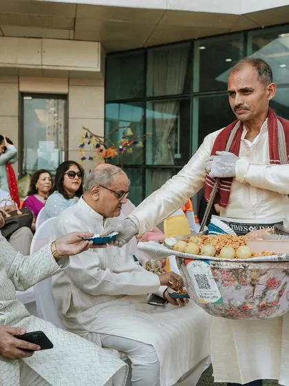 We bring in traditional street food vendors like a 'Chana Chor Garam' wala to add a touch of nostalgia and a unique culinary experience for guests.