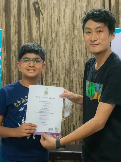 A student from our HSR branch receives his Trinity College certificate. I am proud to facilitate these achievements across all my school locations.