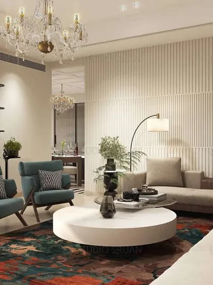 Another view of the same living area, highlighting the fluted wall paneling and the comfortable seating arrangement, designed to encourage conversation and relaxation.