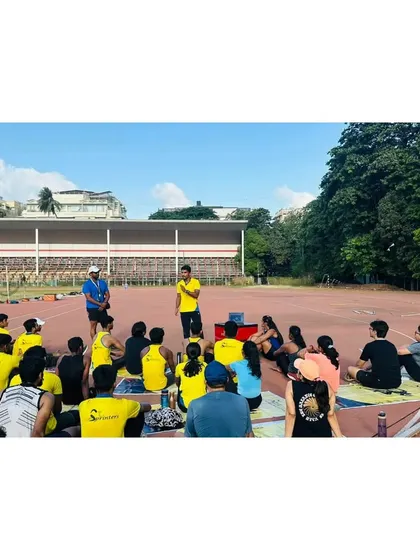 An interactive nutrition workshop in session. I believe in empowering athletes with knowledge that extends beyond the track, covering everything from pre-workout meals to post-training recovery.