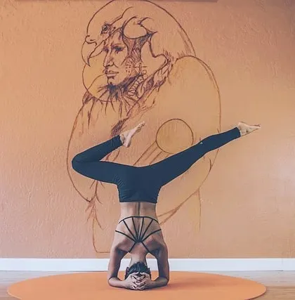 A custom line-art mural for a yoga or wellness studio. I can paint designs that align with your business's brand and create a specific atmosphere for your clients.