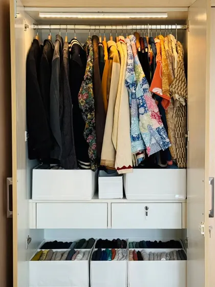This is the kind of beautiful, functional cupboard I love creating. By using file-folding in baskets and drawers, we make every item visible and easy to grab.