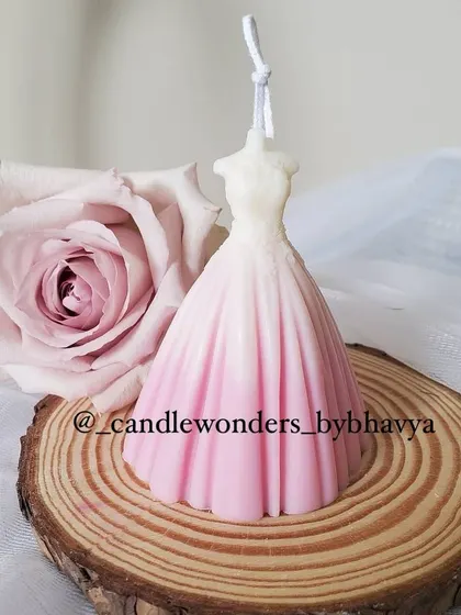 This wedding dress candle is a perfect, elegant gift for a bridal shower or as a keepsake for the bride-to-be. It's a beautiful, handcrafted symbol of the special day.