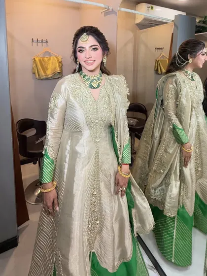 A full-length view of this unique and elegant outfit, complemented by our makeup and hair styling.