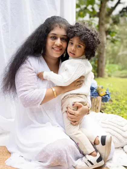 A sweet mother and son portrait taken during an outdoor family session. The natural light is soft and beautiful.