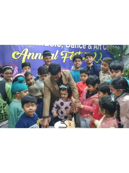Our founder, Vinit Kumar, joins young students for a cake cutting ceremony during our 27th Annual Solo Fest in 2022. These events are a cherished tradition, bringing our community together to celebrate.