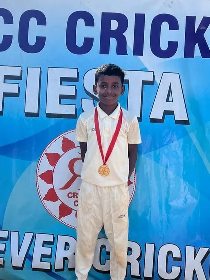 Prakyath Hoskeri with his medal and trophy.