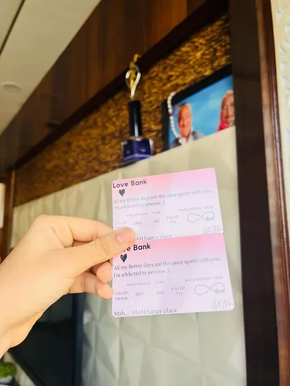 Another look at the "Love Bank" wallet cards. They are designed to be a constant reminder of your love and connection.