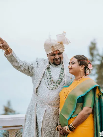 A happy, candid moment between the couple with the beautiful Mussoorie landscape in the background.