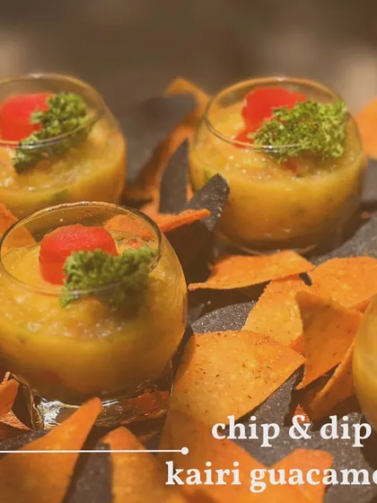 A unique twist on a classic dip. This is my Kairi Guacamole, made with raw mango for a tangy kick, served with colorful tortilla chips.