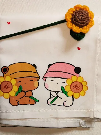 This handkerchief design features the cute characters holding sunflowers. The bright colors and adorable expressions make it a cheerful and lovely gift.