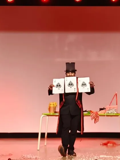 Big stage, big magic. For large auditoriums and corporate events, I use oversized props like these playing cards to ensure everyone, even in the back row, can see and enjoy the illusion.