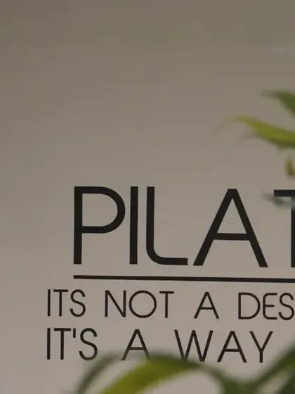 Pilates isn't just a destination; it's a way of life. This reminder on our wall is at the heart of our philosophy.