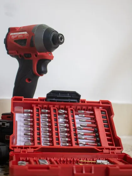 A power drill and a full set of driver bits. We teach kids how to safely operate power tools, building their confidence and capability for more advanced projects.