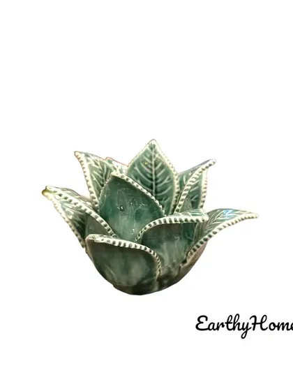 A slightly different design of our leaf tealight holder, this one with more pointed leaves. It's a delicate and elegant piece for any tabletop.
