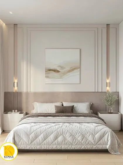 A frontal view of the bed, showing the symmetrical design with matching nightstands and wall sconces.