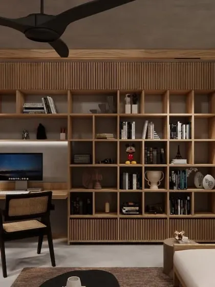 The interior of the HAUS 5 library, showing its direct visual and physical connection to the outdoor terrace, visible through the large glass doors.