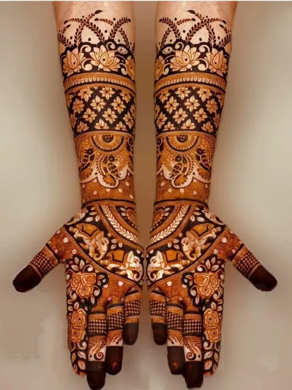 A beautiful symmetrical design featuring elephants and floral patterns. The use of negative space and bold lines gives this traditional design a modern feel.