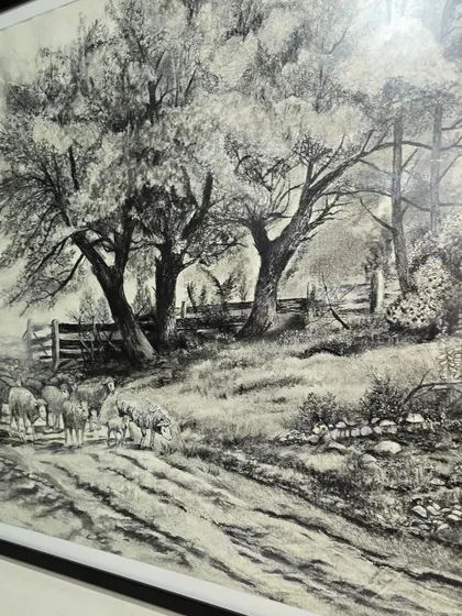 For a classic and timeless look, we offer commissioned charcoal landscapes. These detailed, monochromatic drawings are perfect for adding a touch of vintage elegance to a dining room or study.