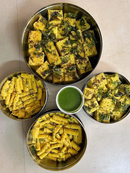 A beautiful arrangement of Khaman Dhokla and Khandvi, two of my most popular Gujarati snacks.