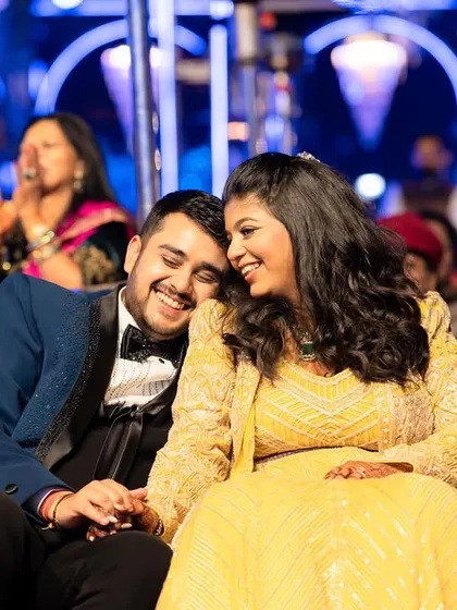 A quiet moment of connection for the couple amidst the Sangeet celebrations. These are the memories that last a lifetime.