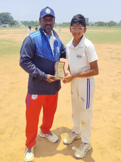 Our coach presenting an award to one of our top performers during the U-13 Eventistic Ventures Cup.